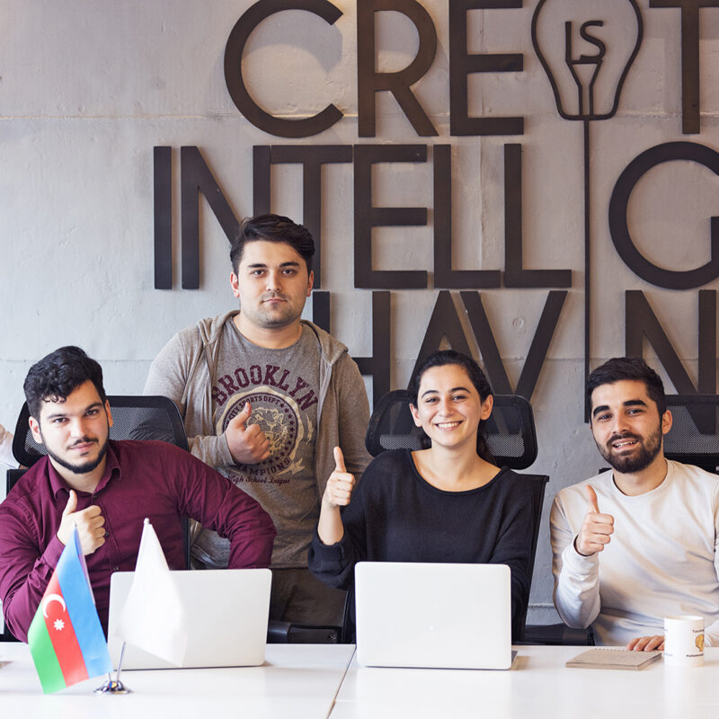 happy-motivated-colleagues-office